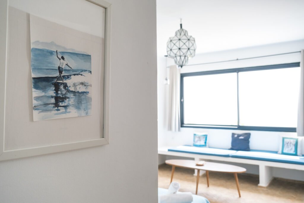 Artwork of surfer in Eau Room at Olo Surf & Nature in Imsoaune Morocco with Ocean view