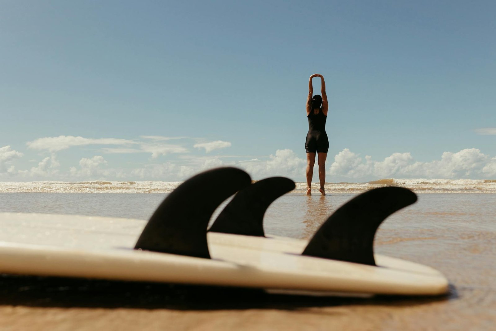 surfer exercising before going into the water