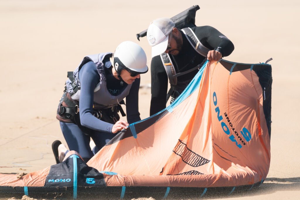 student with instructor on a group kite lesson in Essaouira Morocco with Kite Maroc kite and surf school