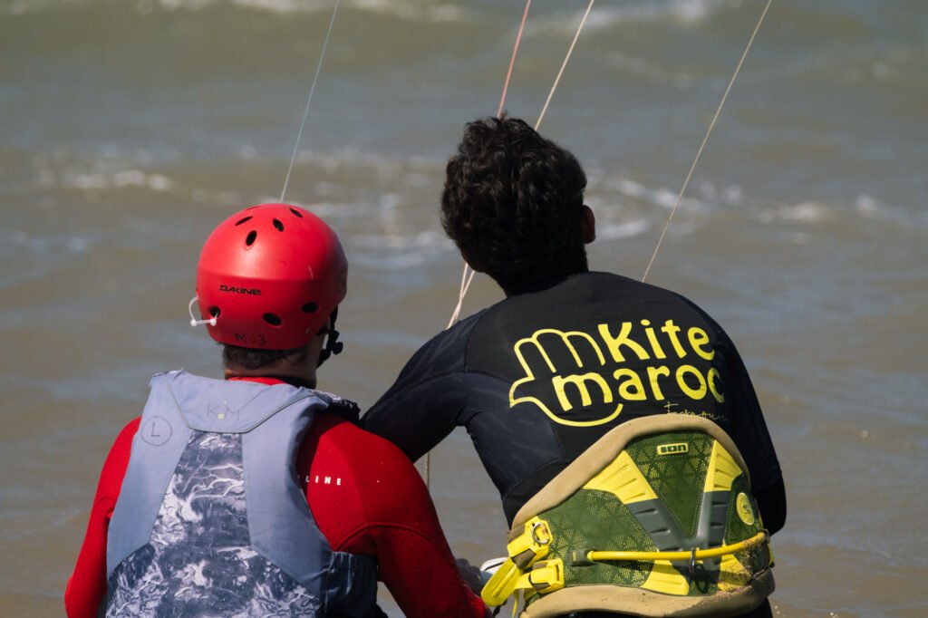 student with instructor on a group kite lesson in Essaouira Morocco with Kite Maroc kite and surf school