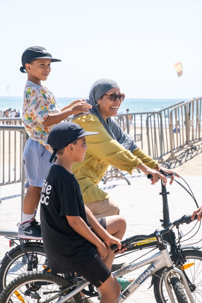 asma, soulymane and medhi from Kite Maroc at kitesurf competition at Essaouira beach in Morocco for association juene essaouira sports nautique