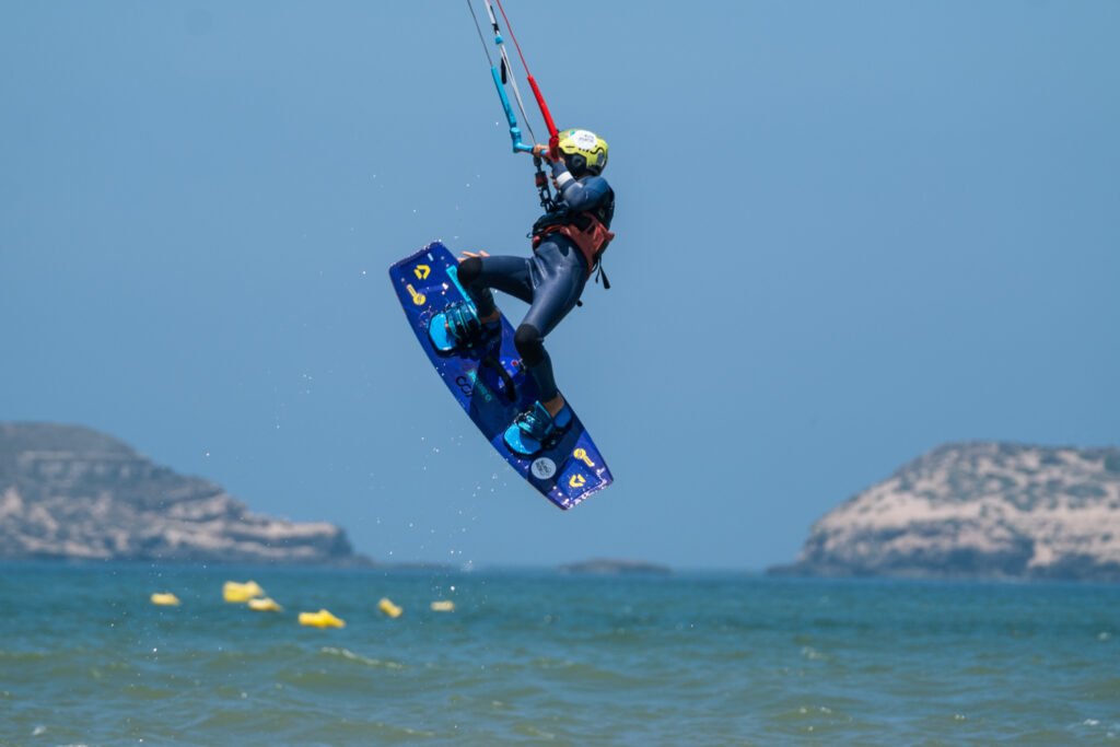asma, soulymane and medhi from Kite Maroc at kitesurf competition at Essaouira beach in Morocco for association juene essaouira sports nautique