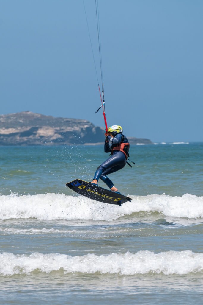 asma, soulymane and medhi from Kite Maroc at kitesurf competition at Essaouira beach in Morocco for association juene essaouira sports nautique