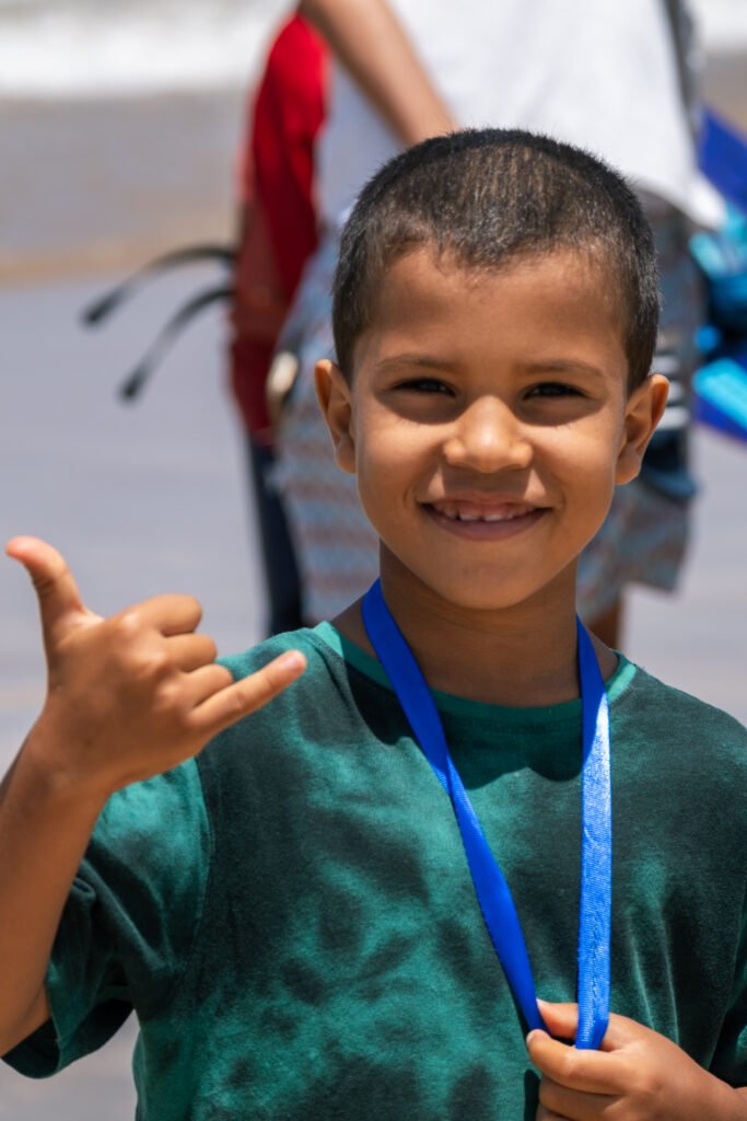asma, soulymane and medhi from Kite Maroc at kitesurf competition at Essaouira beach in Morocco for association juene essaouira sports nautique