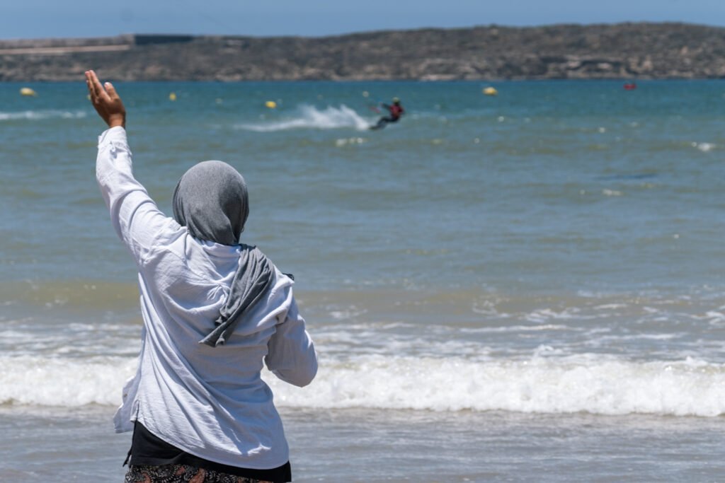 asma, soulymane and medhi from Kite Maroc at kitesurf competition at Essaouira beach in Morocco for association juene essaouira sports nautique